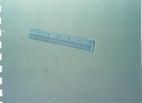 JH1 area before chemical enhancement, with a ruler visible